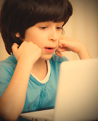 Image showing boy with white notebook