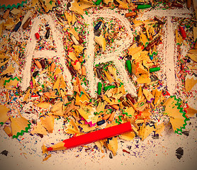 Image showing art word on the background of pencil shavings