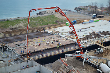 Image showing Pouring concrete on construction side.