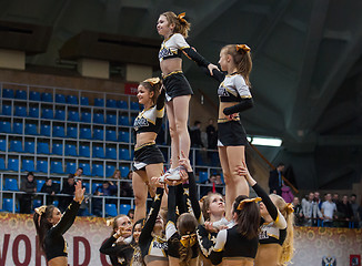 Image showing Acrobatic show cheerleaders