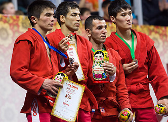 Image showing Khasanov E., Sukhomlinov E., Ernazov S., Serikov N., on podium