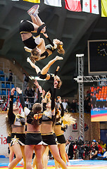 Image showing Acrobatic cheerleaders