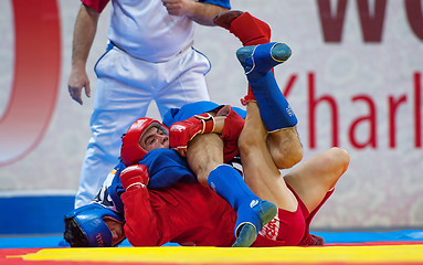 Image showing Kanzhanov B. (Red) and  Umbayev N. (Blue) fights