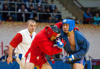 Image showing Ikram Aliskerov (R) fights Jeon Yong jun (B)