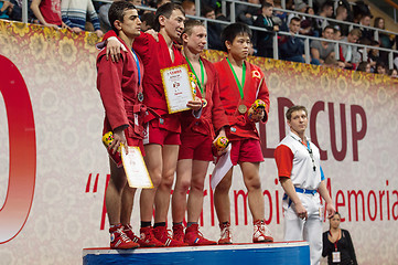 Image showing Umbaev N., Kanzhanov B., Klyukin A., Yamamoto K. on podium