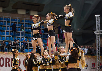 Image showing Acrobatic show cheerleaders