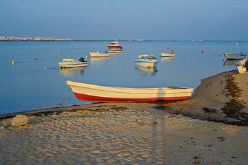 Image showing Photo of boats at sunset