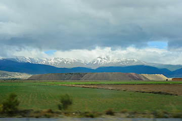 Image showing Mountains tops in snow on the background