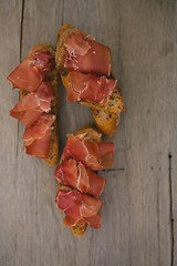 Image showing sliced prosciutto 