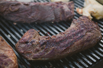 Image showing Meat on BBQ. Shallow DOF.