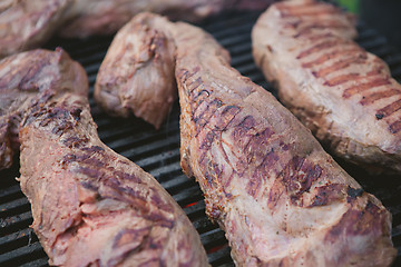 Image showing Meat on BBQ. Shallow DOF.