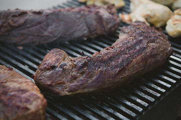 Image showing Meat on BBQ. Shallow DOF.