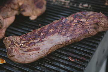 Image showing Meat on BBQ. Shallow DOF.