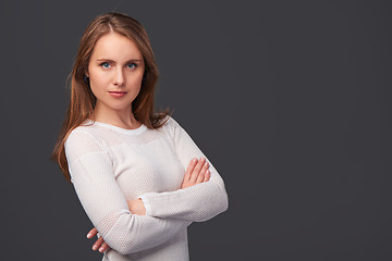 Image showing Portrait of a woman with folded hands