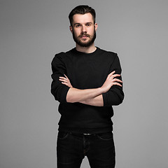 Image showing Fashion portrait of young man in black 