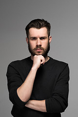 Image showing Fashion portrait of young man in black 