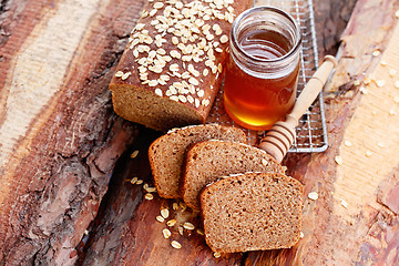 Image showing bread with honey and oats