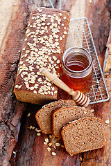 Image showing bread with honey and oats