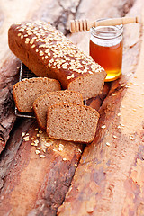 Image showing bread with honey and oats