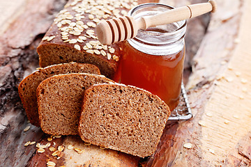 Image showing bread with honey and oats