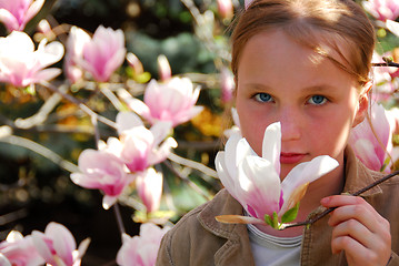 Image showing Girl with magnolia