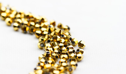 Image showing Golden glass beads