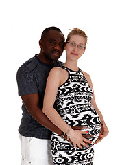 Image showing Closeup of white woman pregnant black man.