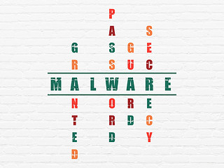 Image showing Safety concept: word Malware in solving Crossword Puzzle