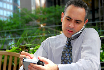 Image showing Busy businessman