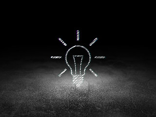 Image showing Business concept: Light Bulb in grunge dark room