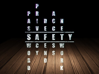 Image showing Safety concept: word Safety in solving Crossword Puzzle