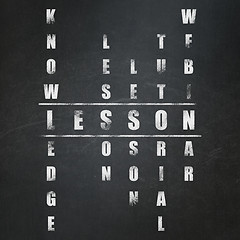 Image showing Education concept: word Lesson in solving Crossword Puzzle