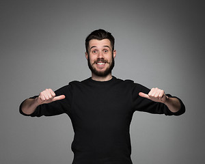 Image showing young man pointing himself