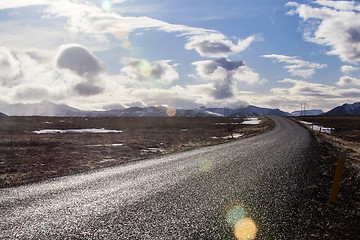 Image showing Snowy volcano landscape with dramatic clouds in Iceland