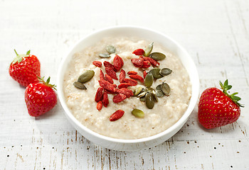 Image showing oat porridge with healthy seeds