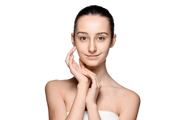 Image showing Portrait of beautiful girl stroking her face with healthy skin 