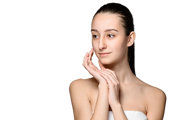 Image showing Portrait of beautiful girl stroking her face with healthy skin 