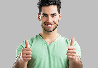 Image showing Handsome man with thumbs up