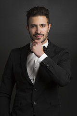 Image showing Latin man wearing a tuxedo