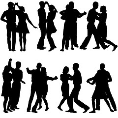 Image showing Black silhouettes Dancing on white background. 