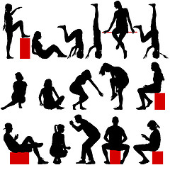 Image showing Black silhouettes of men and women in a pose sitting 