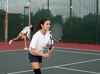 Image showing Girls playing tennis