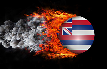 Image showing Flag with a trail of fire and smoke - Hawaii