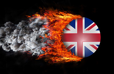 Image showing Flag with a trail of fire and smoke - United Kingdom