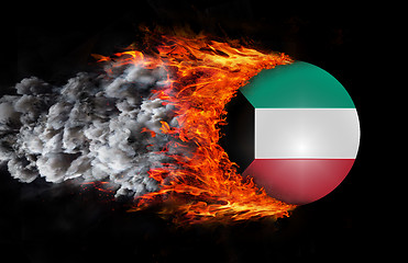 Image showing Flag with a trail of fire and smoke - Kuwait