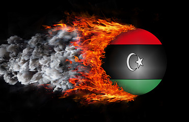 Image showing Flag with a trail of fire and smoke - Libya