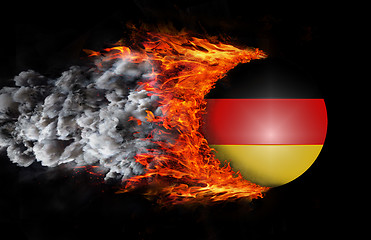 Image showing Flag with a trail of fire and smoke - Germany