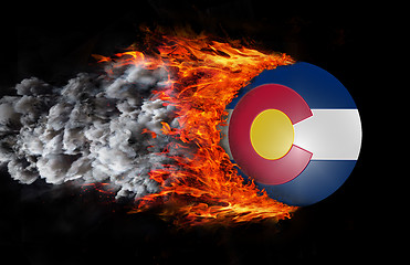 Image showing Flag with a trail of fire and smoke - Colorado