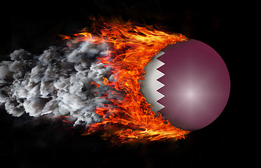 Image showing Flag with a trail of fire and smoke - Qatar