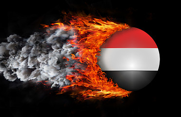 Image showing Flag with a trail of fire and smoke - Yemen